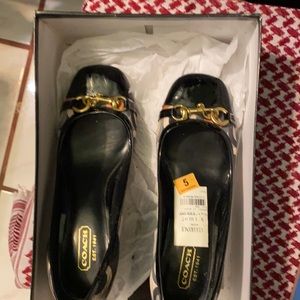 Coach used black printed size 5 shoes